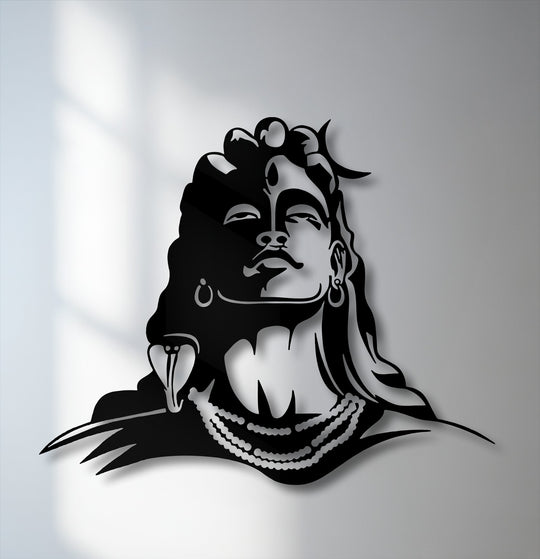 The sleek black finish of this Lord Shiva metal wall decor creates a striking silhouette with elegant shadows.