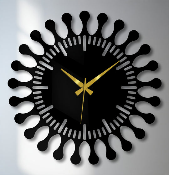 Intriguing, the mood of this luxury decorative wall clock is captured in its modern sunburst metal artwork design with the radiant gold hands.