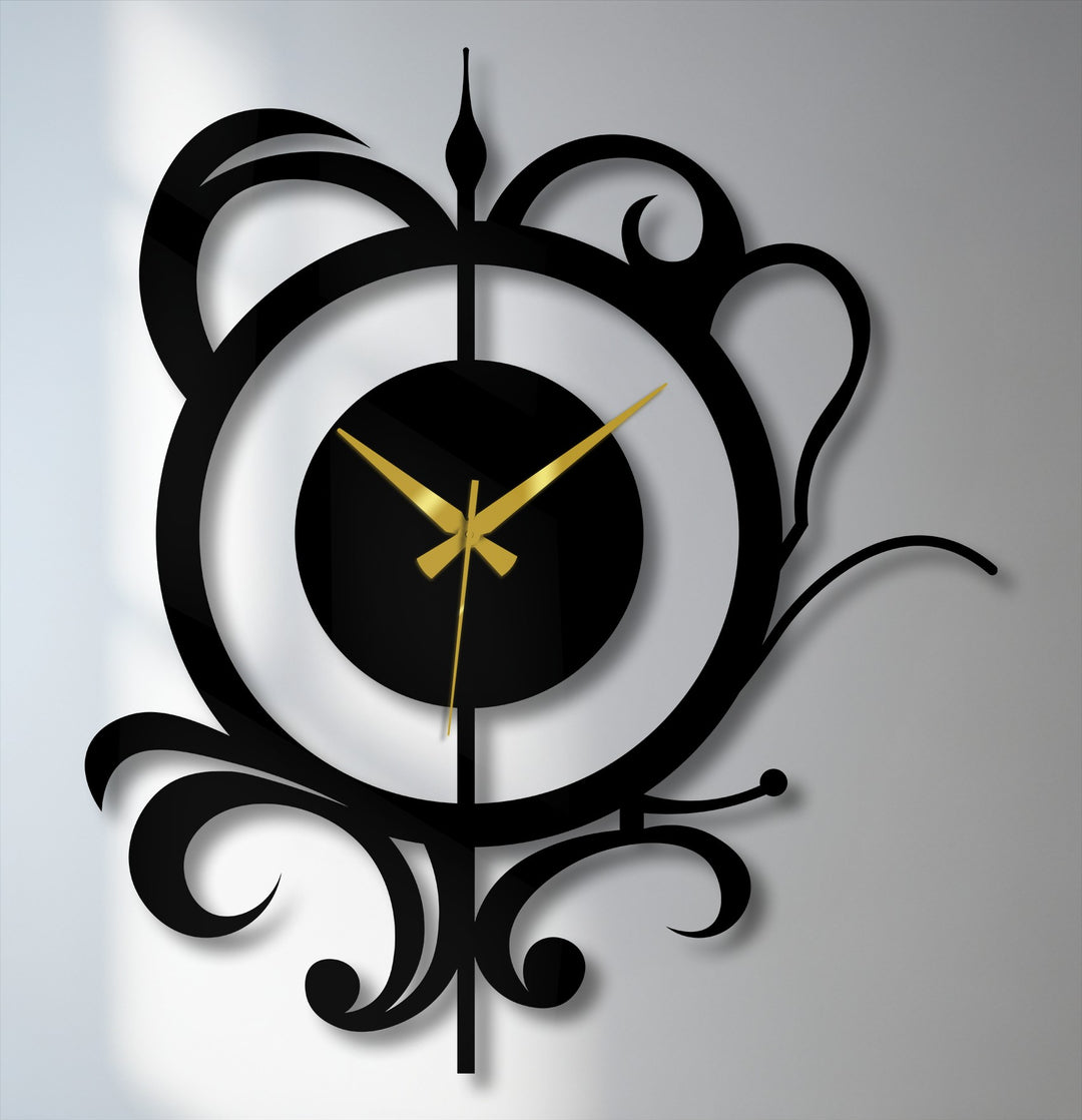 Black metal floral scroll clock, a bold example of metal wall decor, with prominent gold hands create a dramatic and elegant focal point.