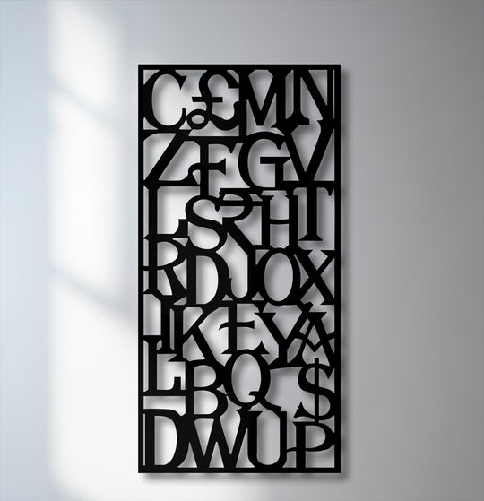 The wall's color transition from bright white to muted gray creates a dynamic backdrop for the unique metal wall art's abstract grid.
