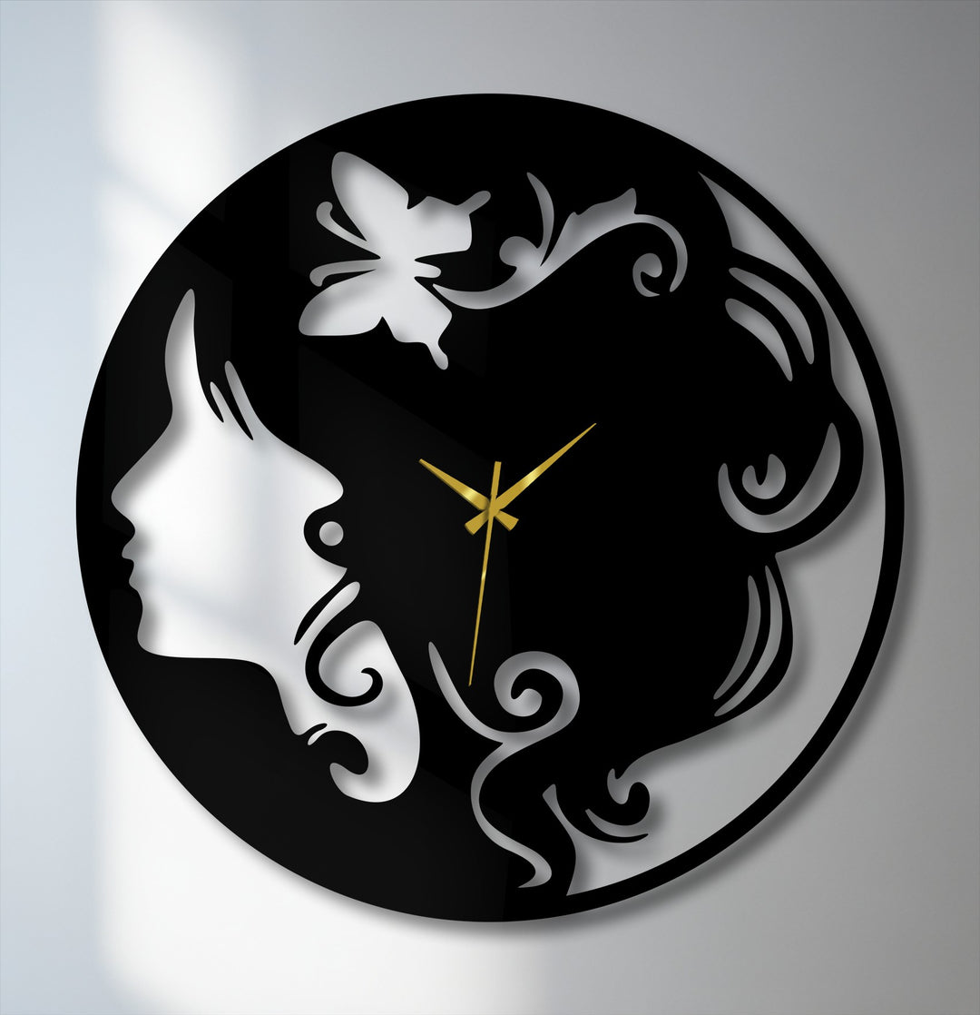 Dynamic lines and a graceful butterfly create a sense of flowing movement within this elegant woman silhouette metal art for wall clock.