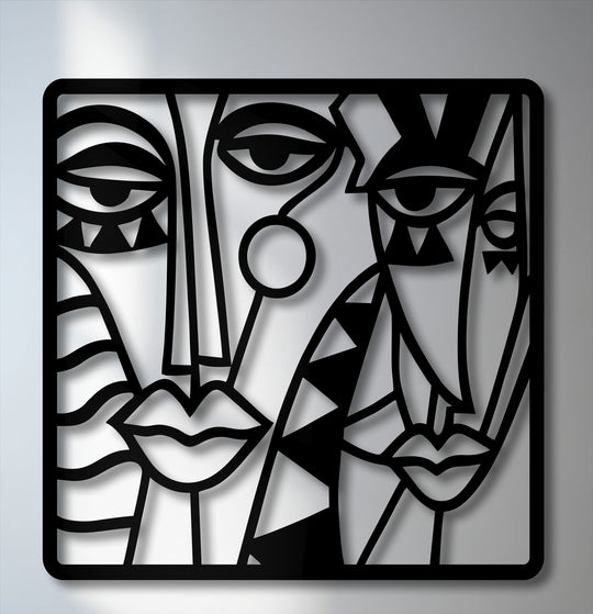 Geometric elements define this striking decorative metal art, showcasing abstract faces through a cubist composition of sharp lines and triangular forms.