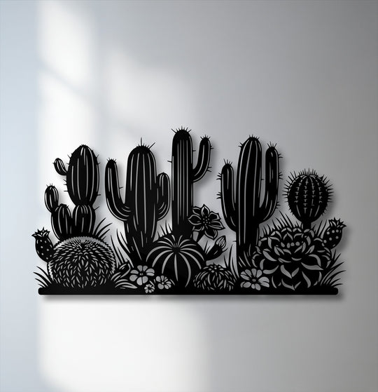 Foreground detail highlights a round cactus, succulents, and small flowers, forming a decorative metal art desert silhouette.