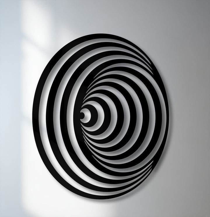 Displaying incredible depth and layers, this hypnotic black and white spiral circle metal artwork creates a mesmerizing optical illusion.
