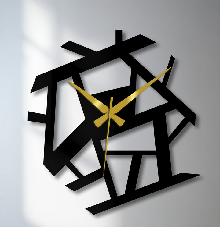 The darkest area of this abstract geometric metal wall clock creates a striking contrast, highlighting the unique design of this decorative metal art piece.