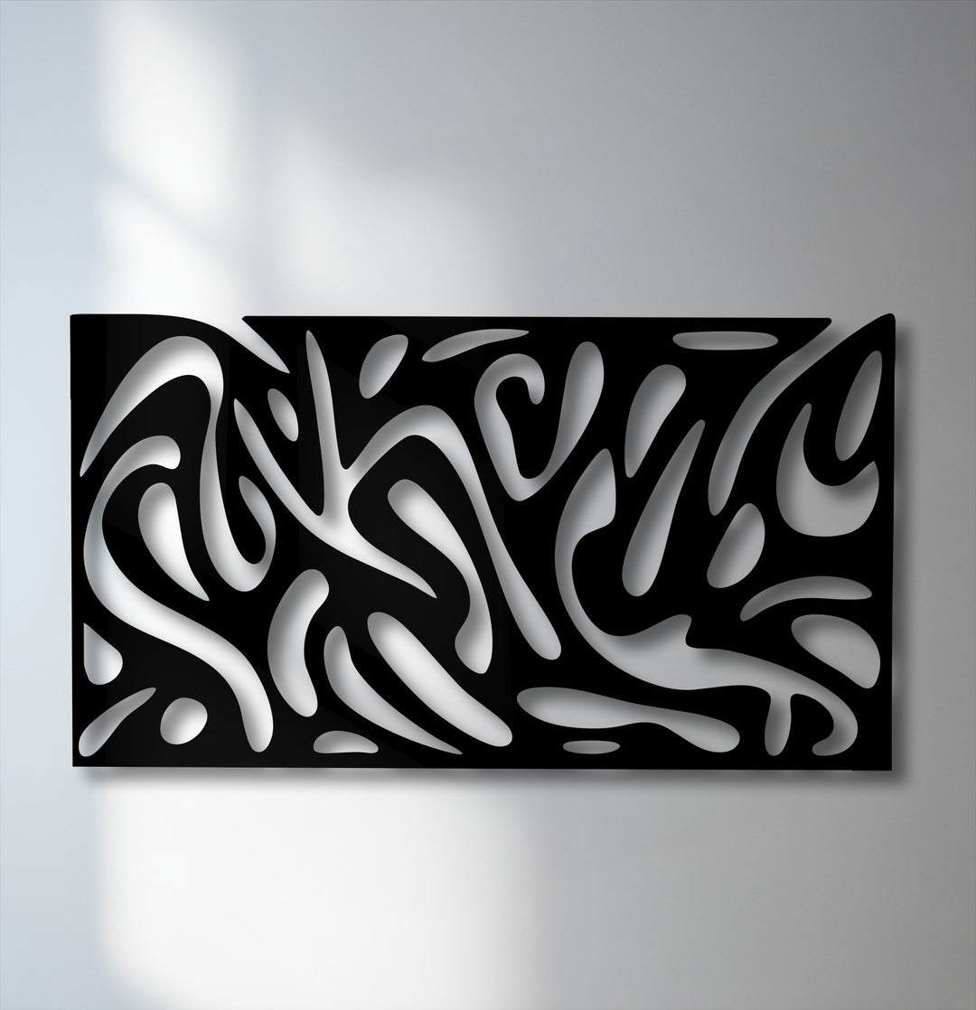 Captivating interplay of light and shadow accentuates the organic fluid patterns of this black metal wall decor, creating depth.