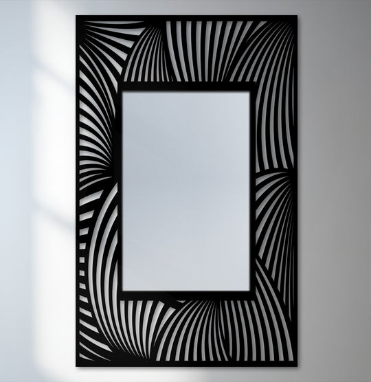 Textured metal art for wall features the flowing wave line pattern of the rectangular floor mirror and its modern black frame.
