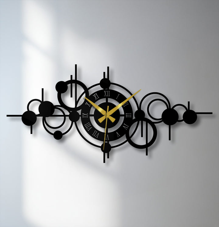 The visual rhythm of the abstract circle orbit metal wall clock creates a striking pattern, a piece of unique metal wall art for modern geometric home decoration.