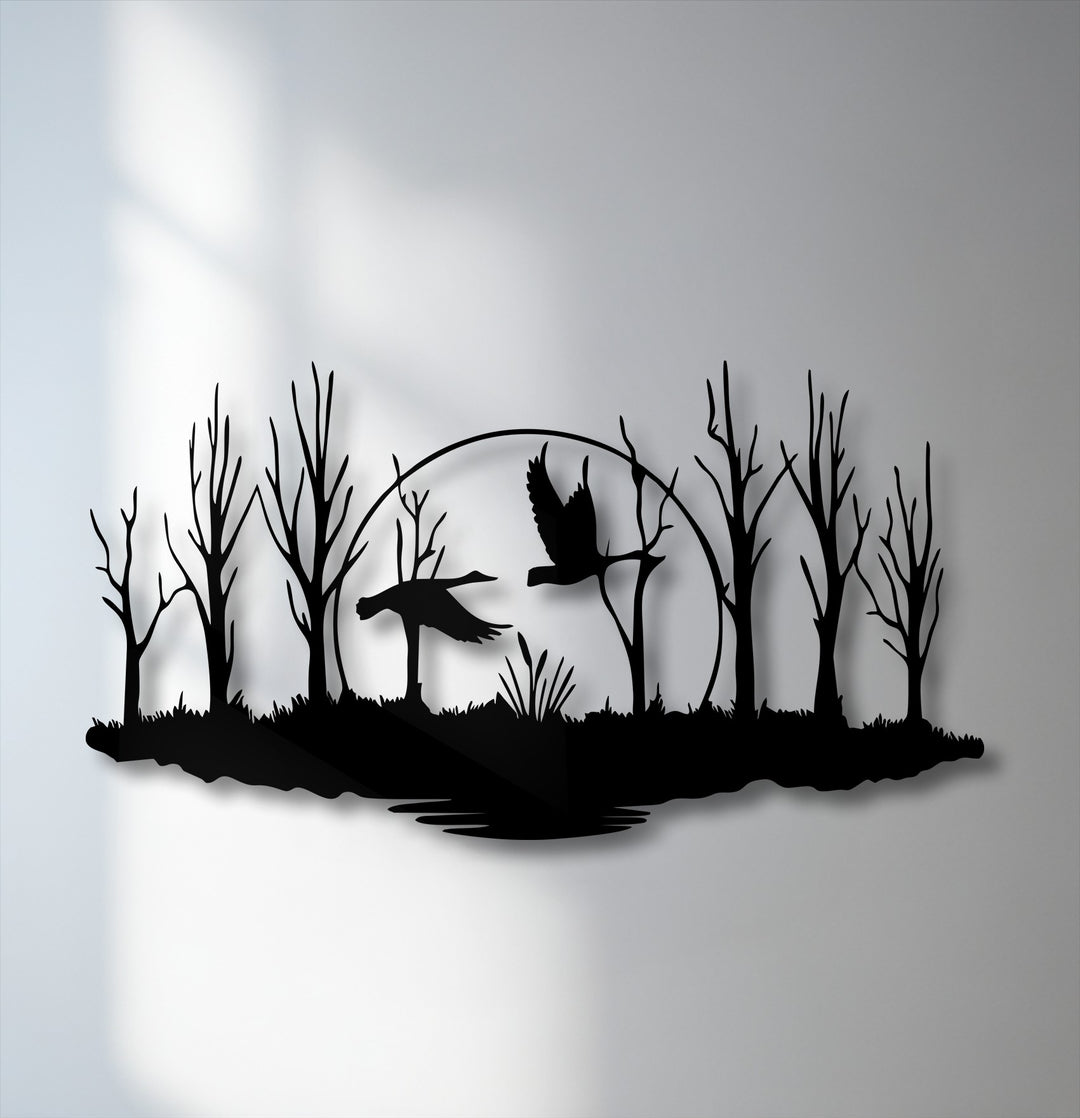 The background features a softly lit light gray wall, creating a subtle contrast for the elegant forest birds metal wall decor.