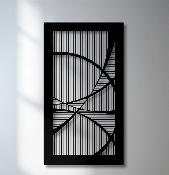The darkest area, a bold black frame, highlights a modern abstract metal artwork with intricate geometric lines and sweeping curves.