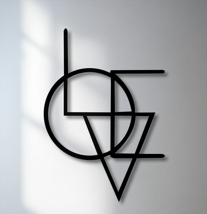 The smooth, matte black finish of this Abstract Geometry Fusion unique metal wall art provides a sleek, modern aesthetic.
