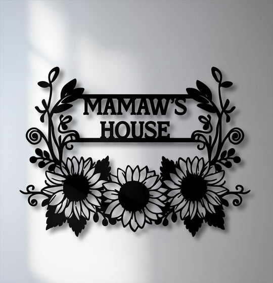 Deeply layered, this personalized sunflower metal decoration wall art for 'Mamaw's House' creates strong visual depth with its bold shadow.