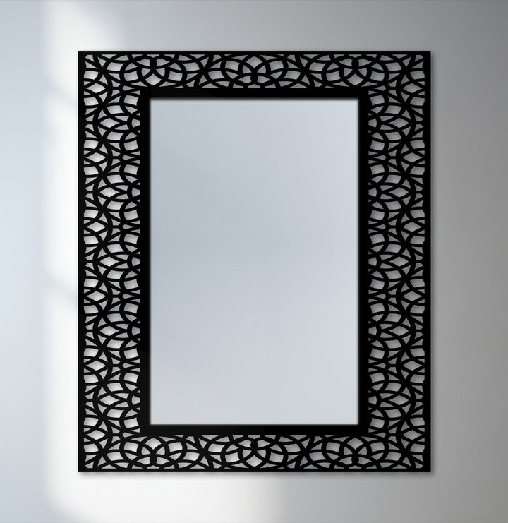 Reflecting the transition between colors, this interlocking arc pattern frame floor mirror features a modern black metal design as decorative metal art.