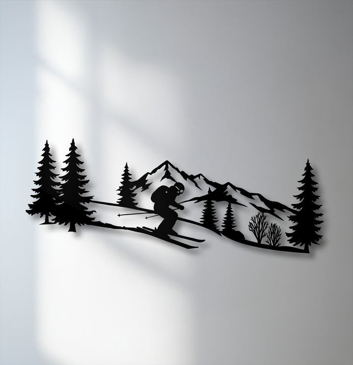 Negative space on the bright wall starkly contrasts the intricate black metal wall decor, showcasing an alpine skier mountain scene.