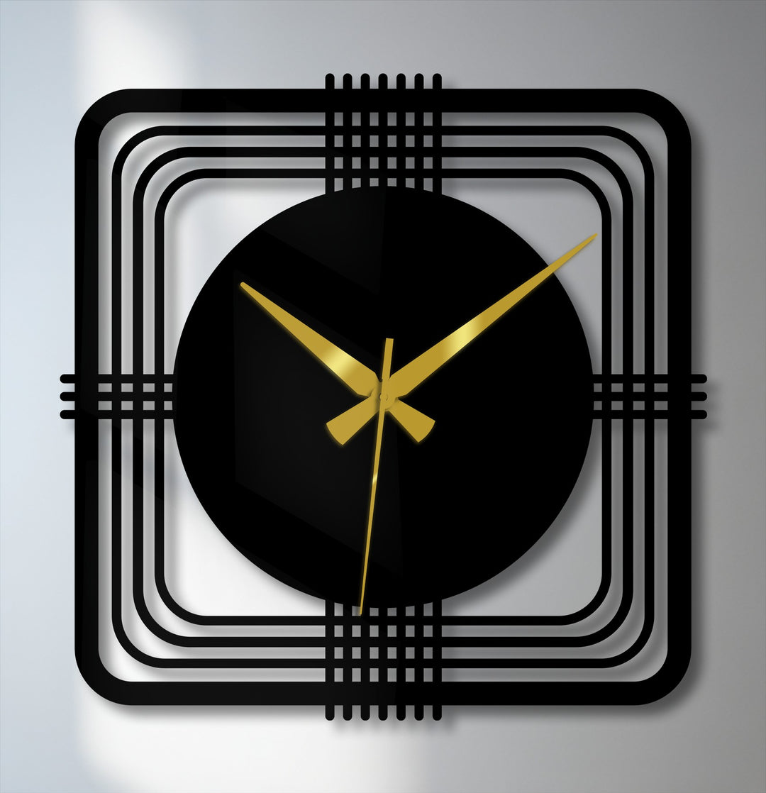 Bold geometric design makes this decorative metal art clock the loudest element, a modern square frame showcasing elegant gold hands.