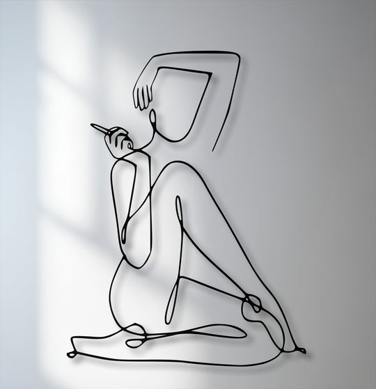 The stillness of the elegant abstract figure in this minimalist female line art metal decoration wall art emanates a serene calm.