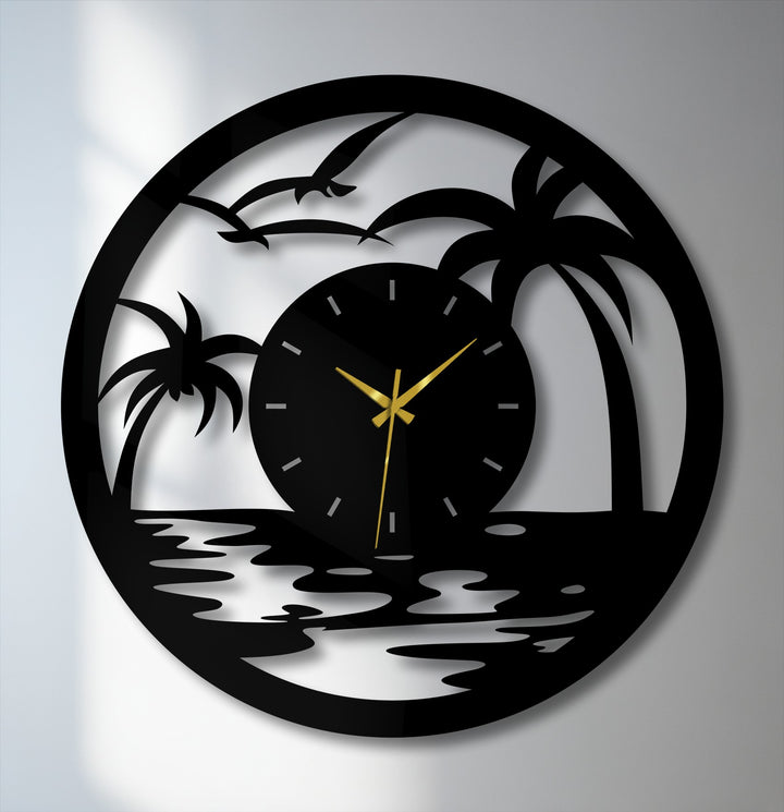 Brightest areas highlight the decoration wall art in this tropical sunset metal wall clock featuring palm trees and a coastal scene.