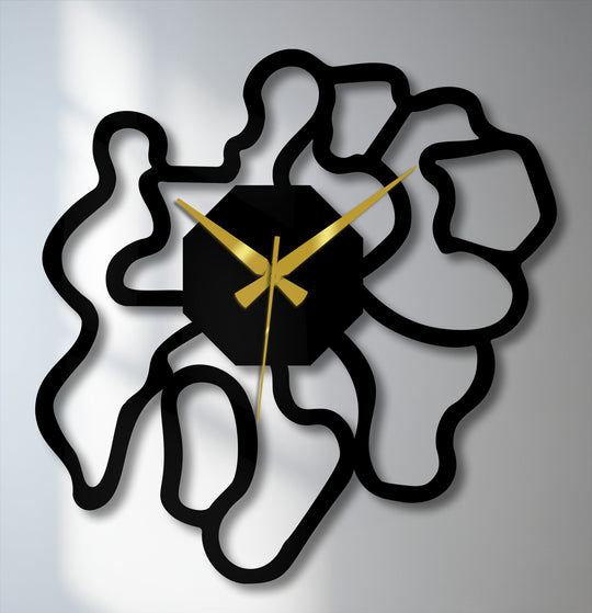 Smooth metal artwork shapes of this modern abstract metal wall clock create a distinct textural contrast, enhancing its contemporary design.