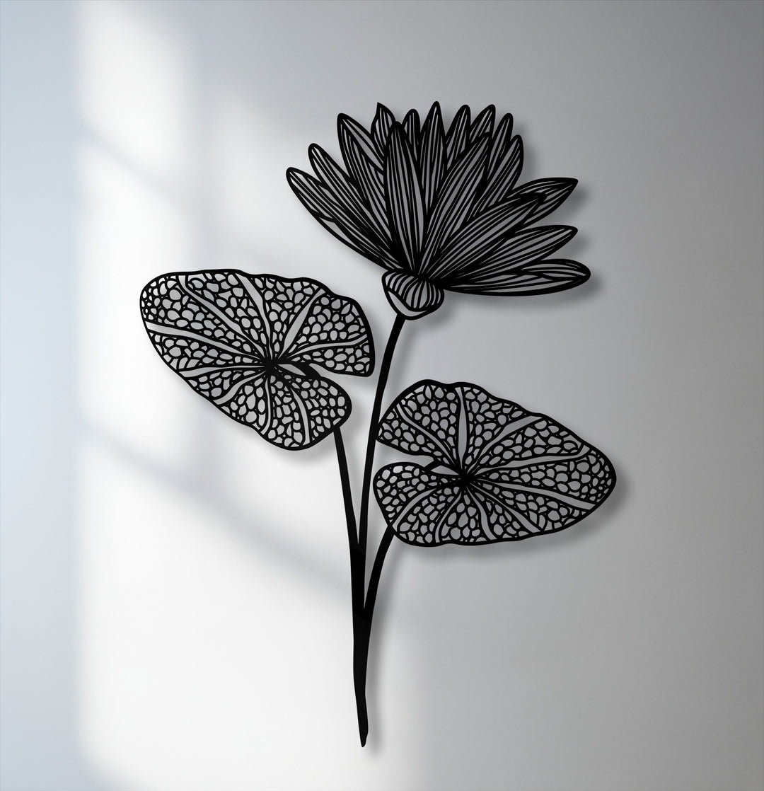 A serene and elegant mood emanates from the delicate black botanical lotus flower decorative metal art piece.