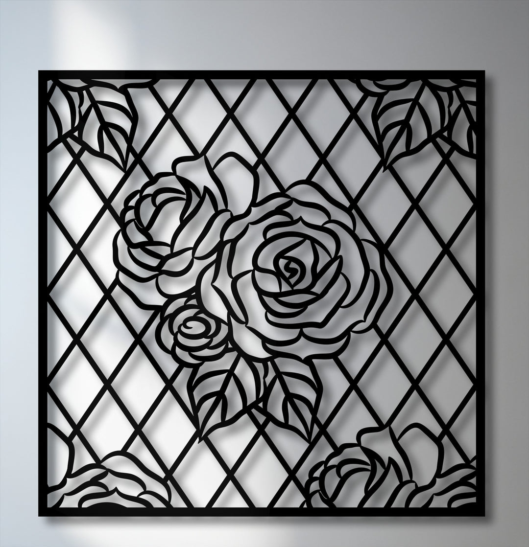Smooth, matte black metal artwork featuring a rose lattice design, casting intricate, textured shadows on the background.