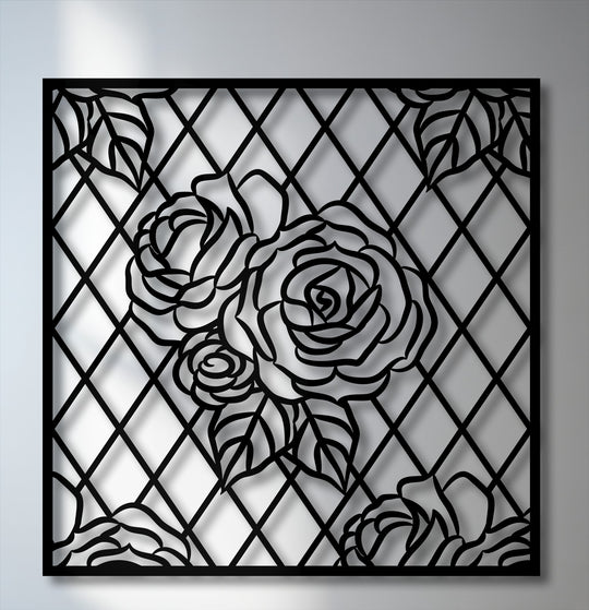 Smooth, matte black metal artwork featuring a rose lattice design, casting intricate, textured shadows on the background.