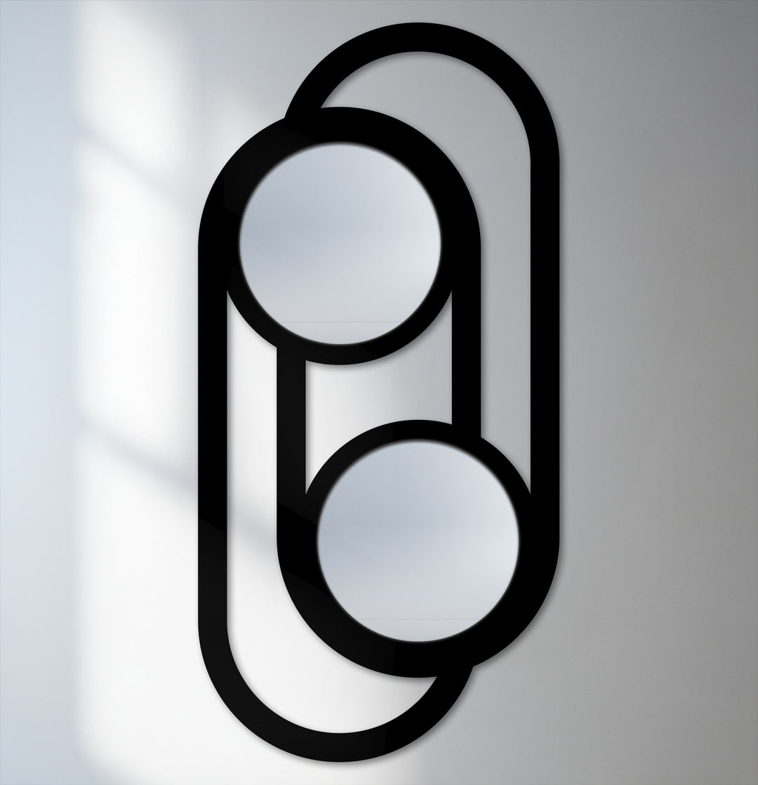 Subtle shadows and soft gradients on the wall behind this modern minimalist double circle link decoration wall art mirror enhance its elegance.