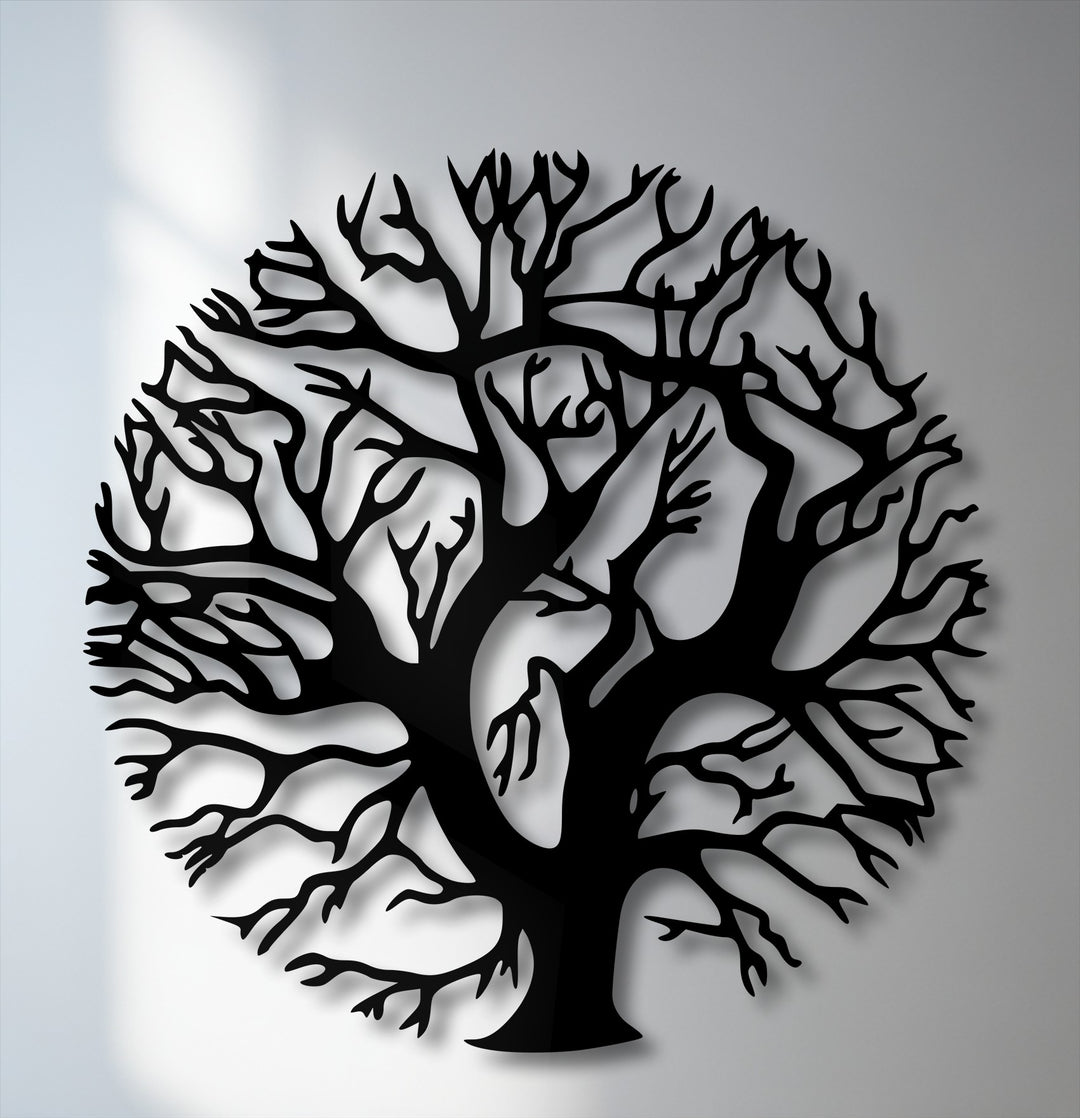 Crafted from durable black metal, this unique metal wall art features a precise Tree of Life silhouette casting elegant shadows.