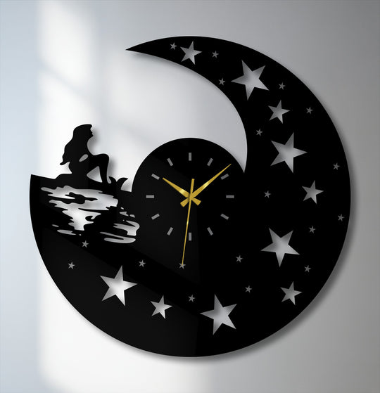 Defined borders showcase the moonlight dream metal wall clock's decoration wall art, a celestial night design edged with cutout stars and a silhouette.