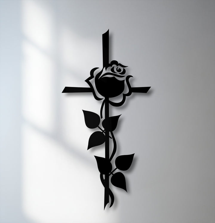 The softest element, delicate rose petals, and a graceful vine entwine a cross in this spiritual floral metal art for wall.
