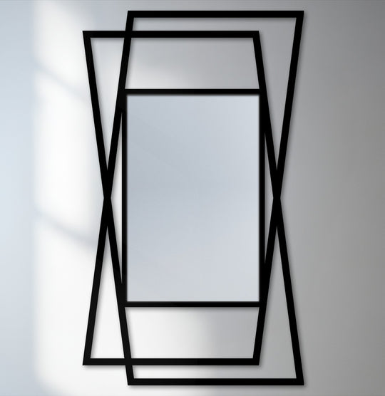 Illuminated to highlight sleek metal artwork, this layered floor mirror features a geometric design, with angular lines and a minimalist black frame.