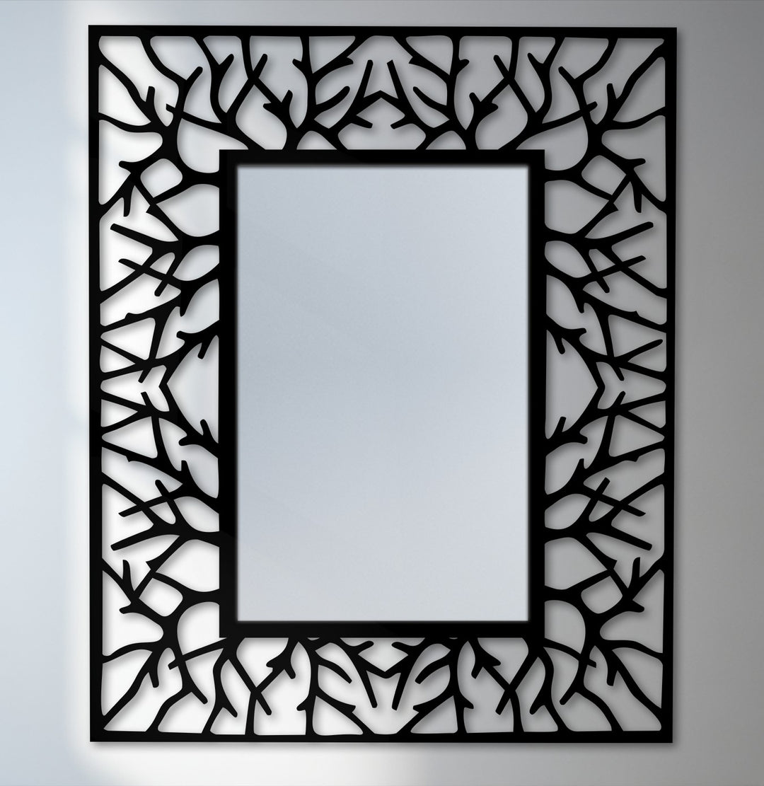 Showcasing a geometric abstract branch texture, this black metal floor mirror features a striking, linear metal artwork frame, creating a compelling design.