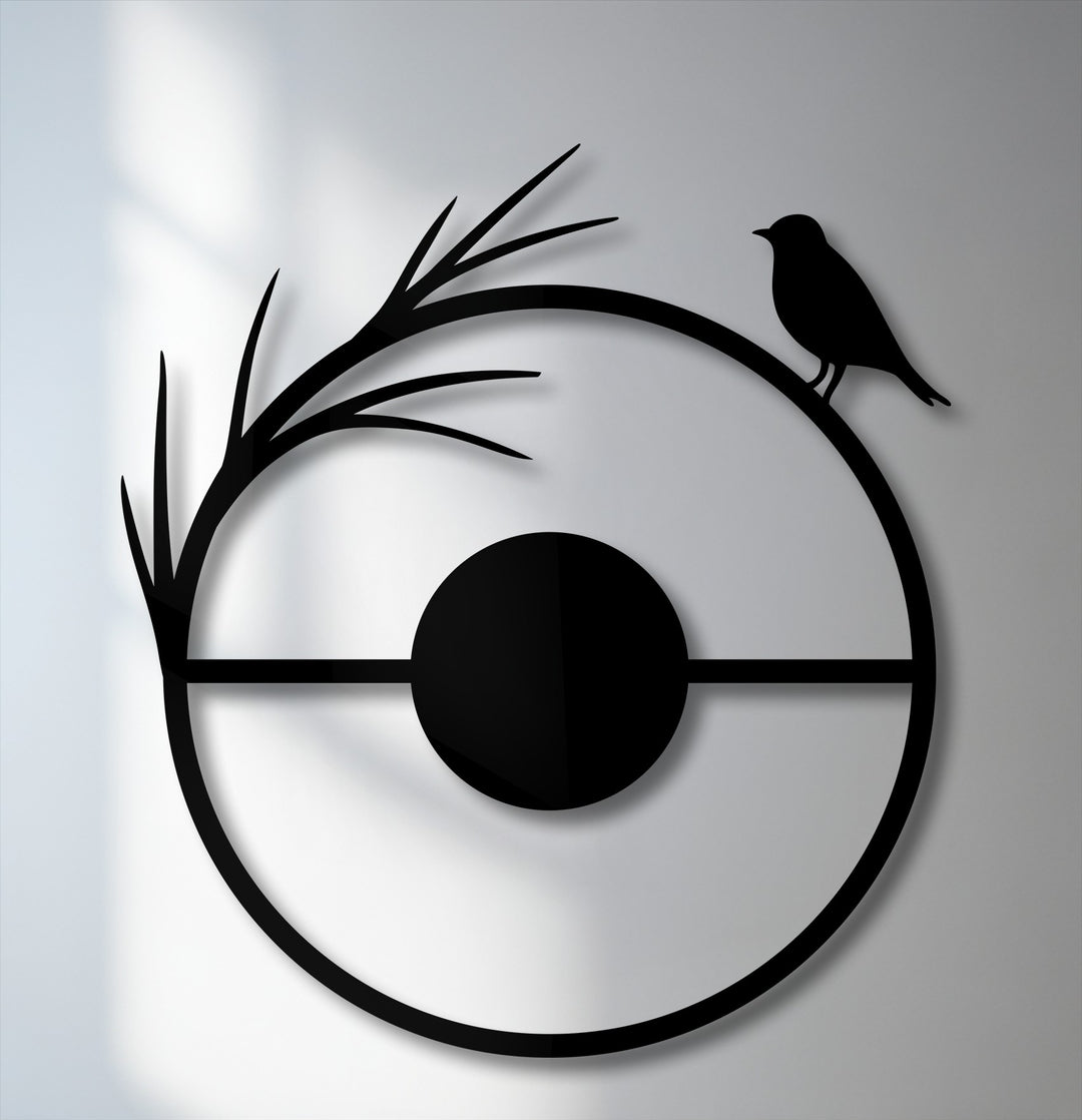The smooth, matte black surface texture of the minimal bird metal artwork creates a modern nature silhouette.