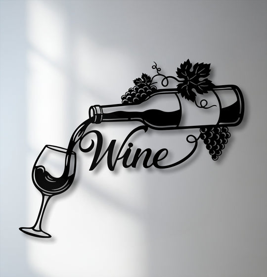 The elegant and inviting mood of this metal artwork showcases a wine bottle pouring into a glass, complemented by grapes and text.