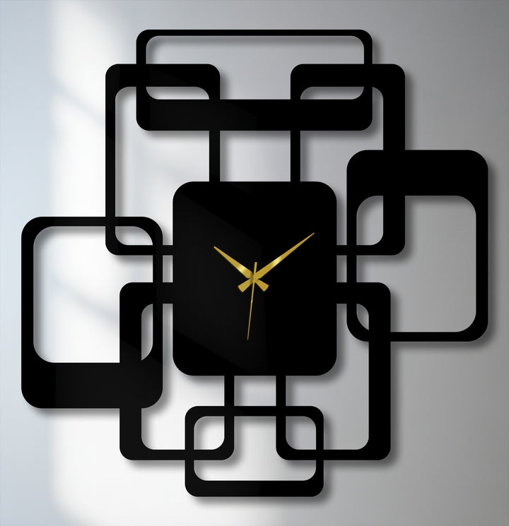 Foreground details highlight the modern interlocking squares in this metal decoration wall art clock, showing its bold geometric design and minimalist appeal.
