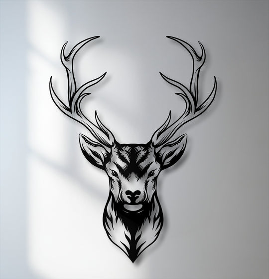 The cool color temperature of this unique metal wall art highlights the stark black majestic deer head and its modern wildlife antler design.