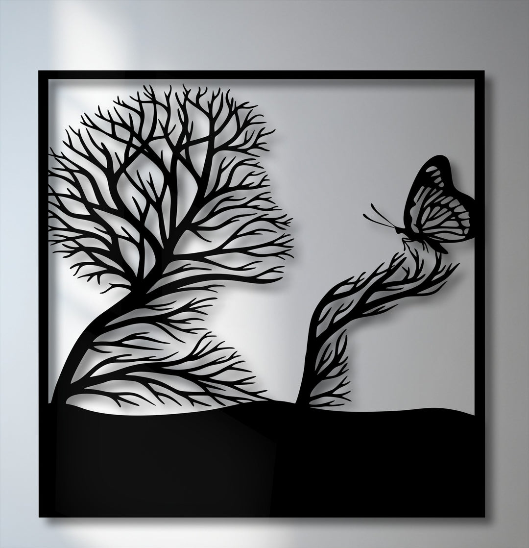 The graceful lines of the tree and the poised butterfly evoke a serene dance in this nature-inspired metal art for wall.