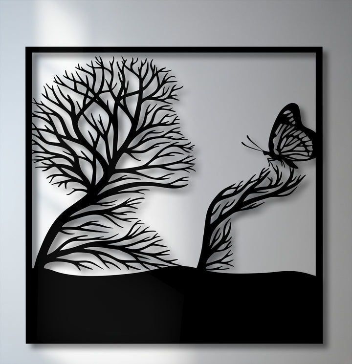 The graceful lines of the tree and the poised butterfly evoke a serene dance in this nature-inspired metal art for wall.
