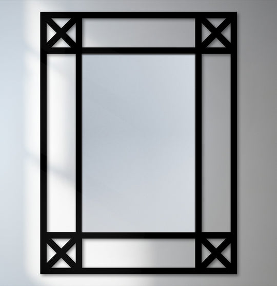 The darkest area of this minimal, black metal floor mirror highlights its unique metal wall art frame and cross detail corners.