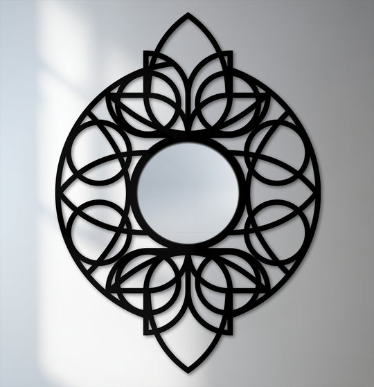 Neutral color temperature highlights the black metal frame's geometric design in this striking circular mandala metal artwork floor mirror.