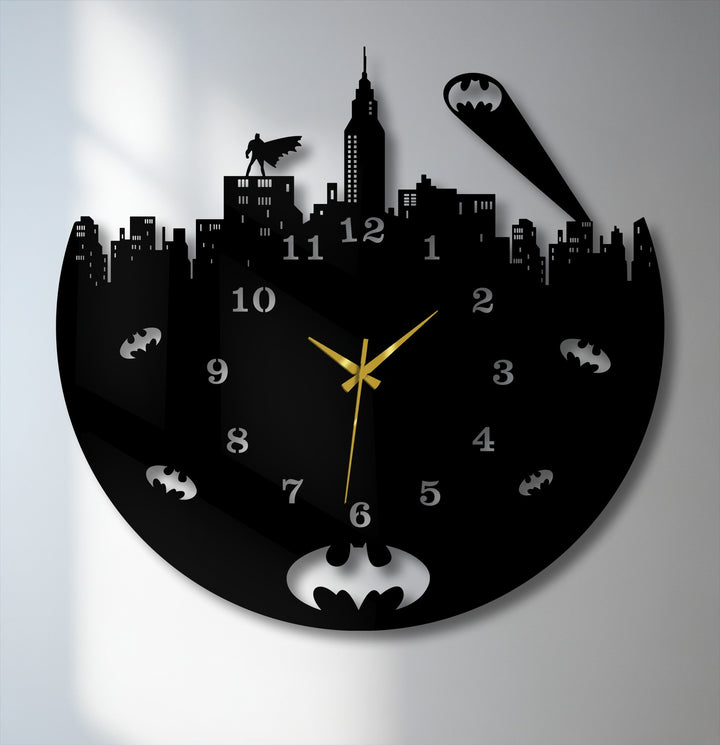 The darkest area of this decorative metal art wall clock features a striking black urban night skyline with Batman and Bat-signal motifs.