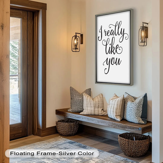 Substantial negative space surrounds the 'I Really Like You' oil painting art piece, creating a minimalist aesthetic on the light wall.