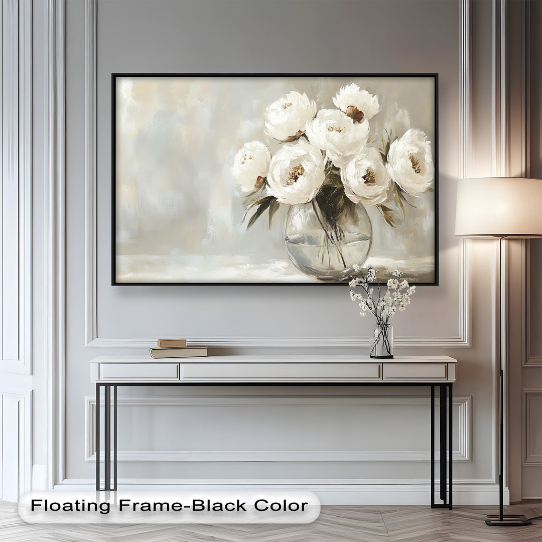 White peony bouquet in a glass vase with soft neutral tones.
