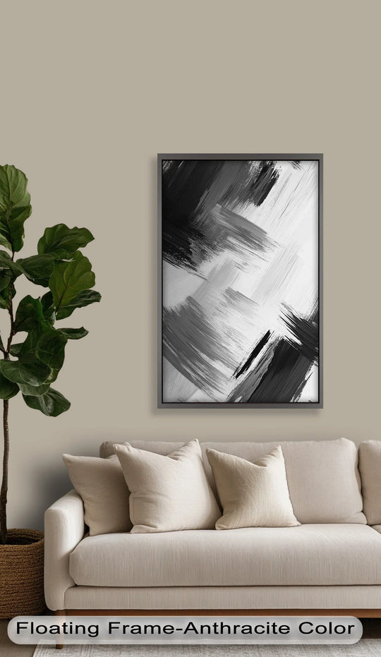 Anthracite finish frames the modern oil painting art, enhancing the bold brushstrokes of this monochrome black and white abstract design above the sofa.