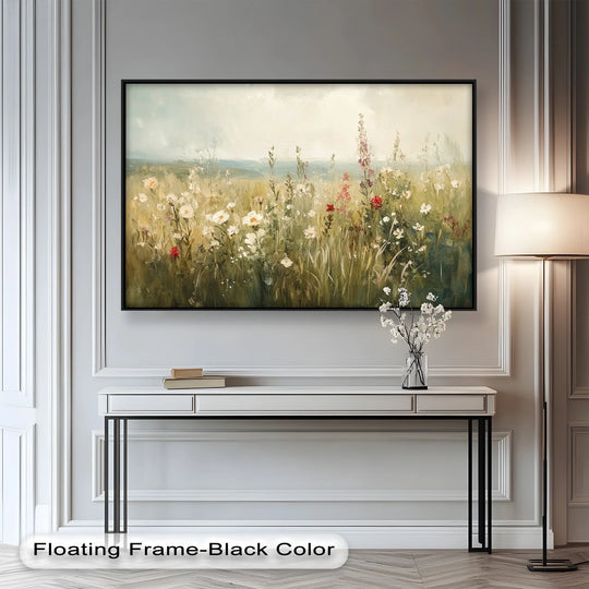 Negative space highlights the muted gray wall surrounding the serene wildflower oil painting decoration, creating a focal point in the artwork's black frame.