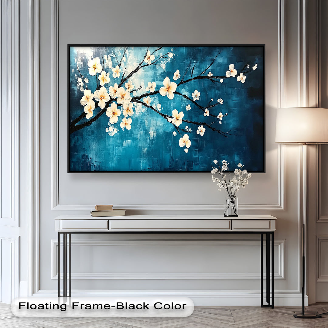 A striking branch of white blossoms in full bloom, set against a rich, textured teal-blue background.

