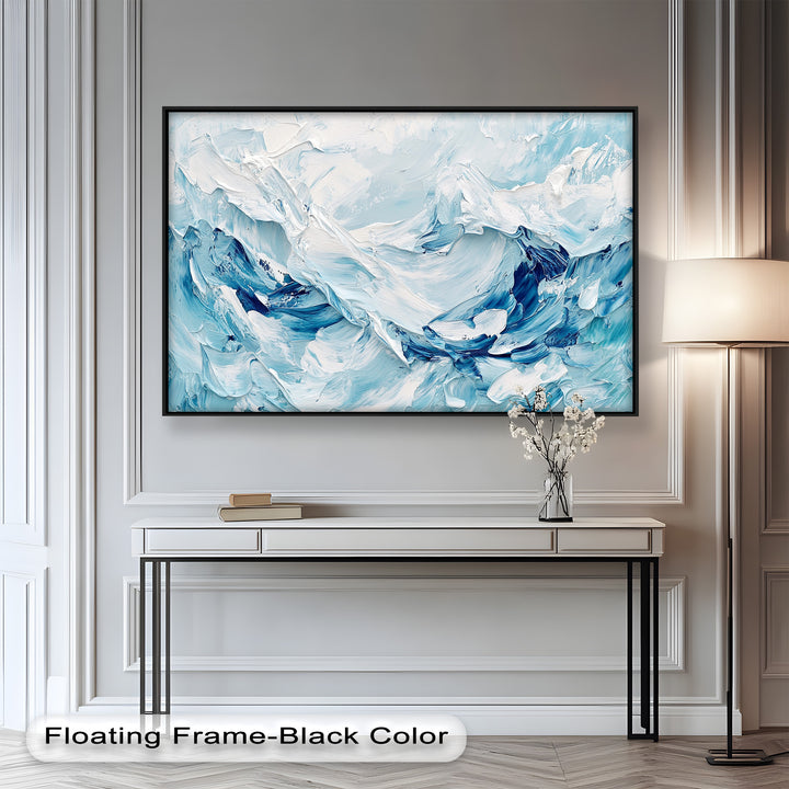Modern coastal abstract artwork featuring swirling blue and white layers.
