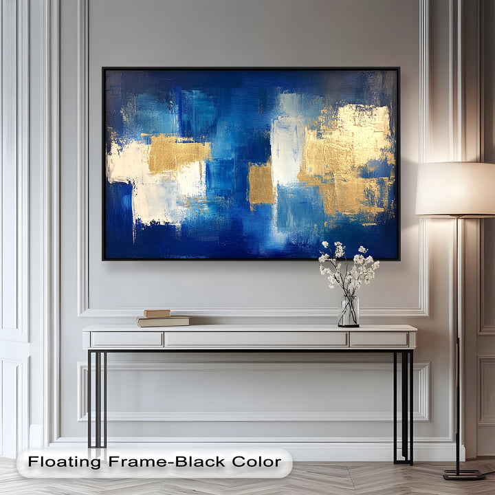 Textured abstract painting with rich sapphire blues and radiant gold layers.
