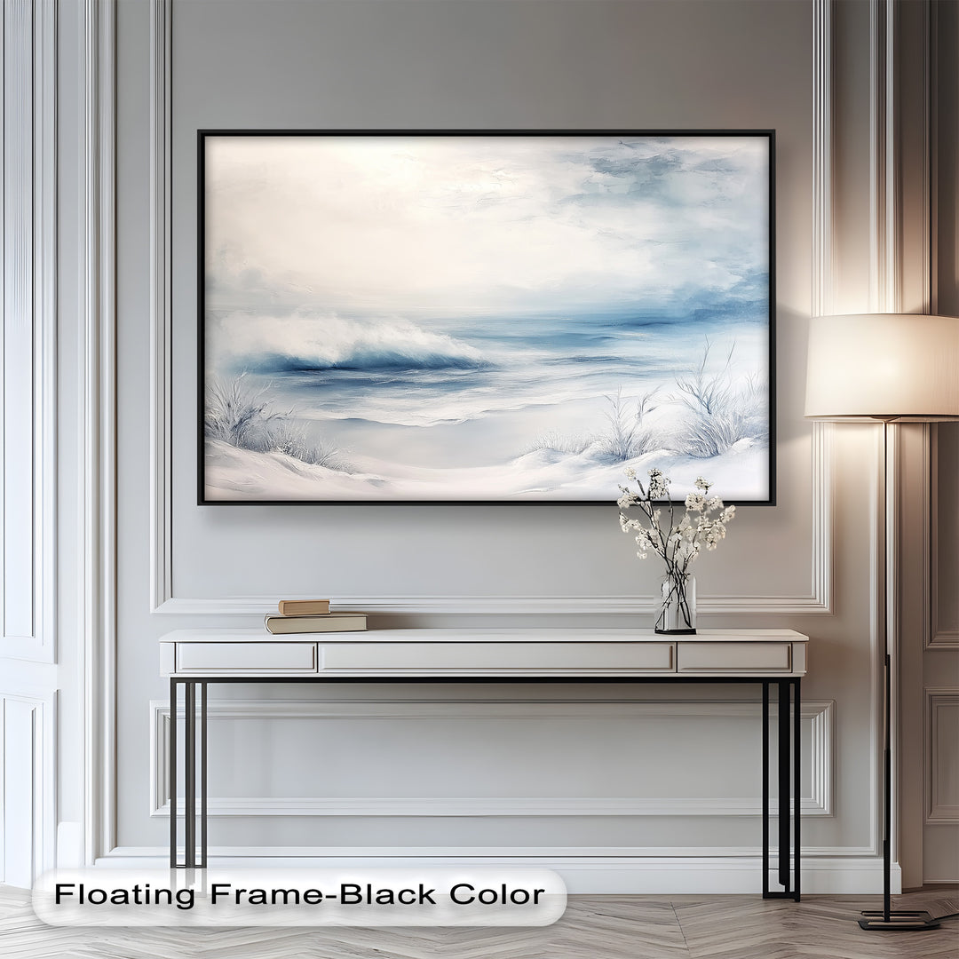 The gentle blending of snow, sea, and sky creates a dreamy composition that invites peaceful contemplation.
