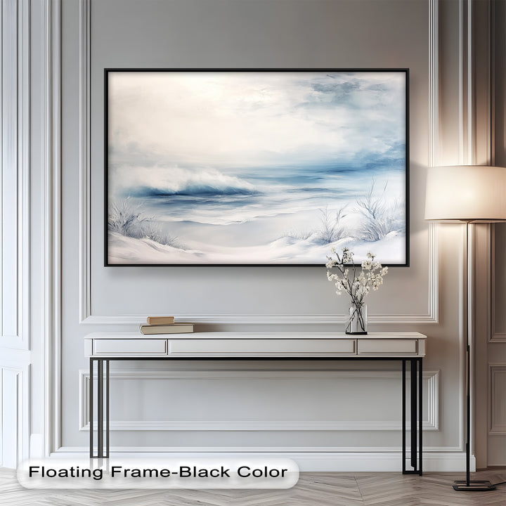The gentle blending of snow, sea, and sky creates a dreamy composition that invites peaceful contemplation.