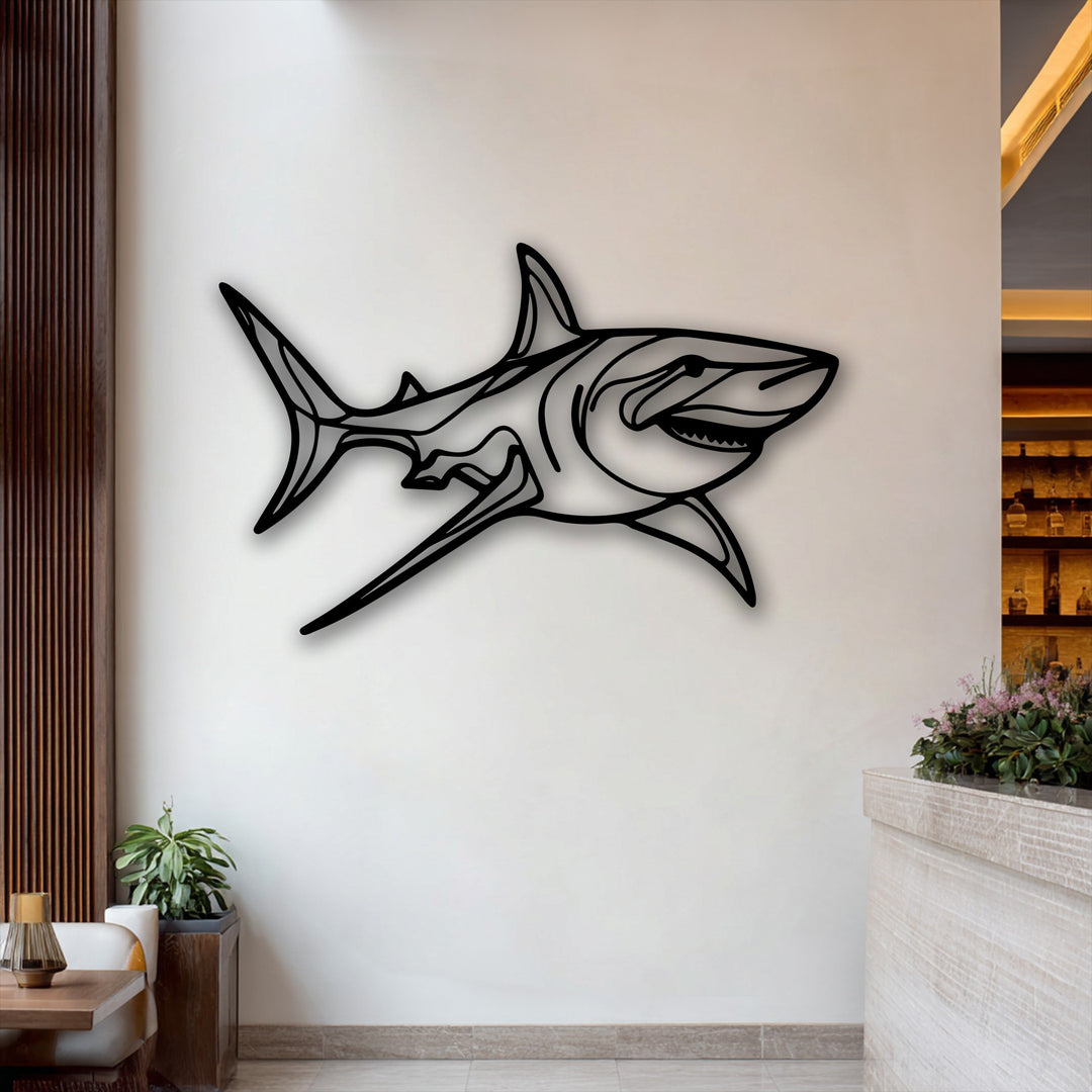 The fluid, organic forms of the stylized great white shark, crafted as decorative metal art, beautifully capture its powerful motion.